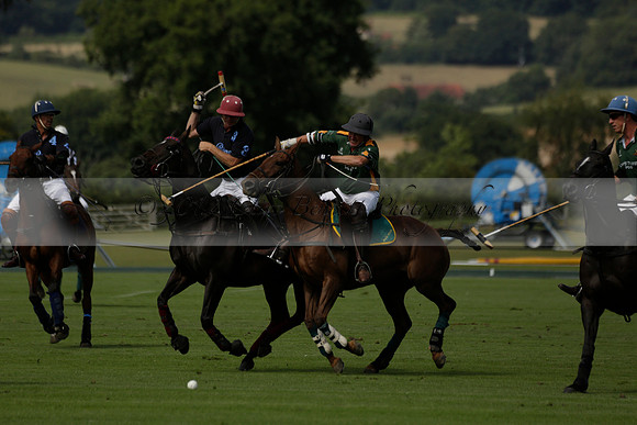 Maiz Dulce (green) v River (blue) in a Uber Polo Midsummer 12 goal polo match on Wednesday 21 August 2013 at Cowdray park Polo Club on Ambersham 2.  www.polopictures.co.uk