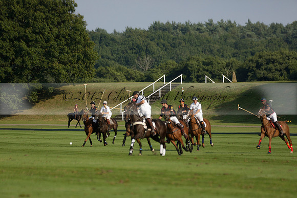 Pluma Negra (white) v Shoreline (black) in the Brecknock Cup Subsidiary final polo match played on Sunday 25 August 2013 at Cowdray Park Polo Club on Ambersham 1. 2013.10.12 www.polopictures.co.uk