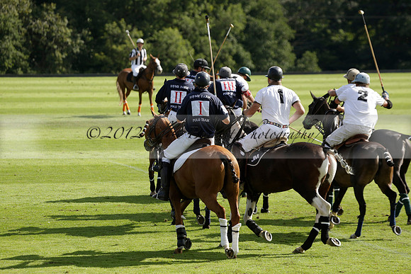 Pandas (white) v Home Farm (navy) in a Park House West Sussex Cup Polo match on Brooksfield at Cowdray Park Polo Club on Friday 30 August 2013. 2013.08.30 www.polopictures.co.uk