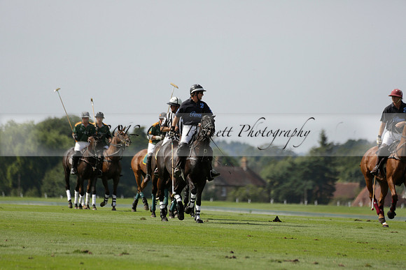 Maiz Dulce (green) v River (blue) in a Uber Polo Midsummer 12 goal polo match on Wednesday 21 August 2013 at Cowdray park Polo Club on Ambersham 2.  www.polopictures.co.uk