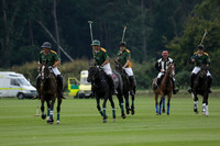 La Tremenda (mauve) v Maiz Dulce (green) in the Brecknock Cup  final polo match. Played at Cowdray Park Polo Club on Sunday 25 August 2013 on Ambersham 1. www.polopictures.co.uk