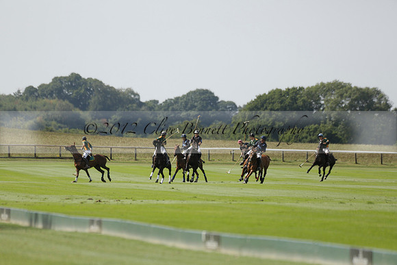 Maiz Dulce (green) v River (blue) in a Uber Polo Midsummer 12 goal polo match on Wednesday 21 August 2013 at Cowdray park Polo Club on Ambersham 2.  www.polopictures.co.uk