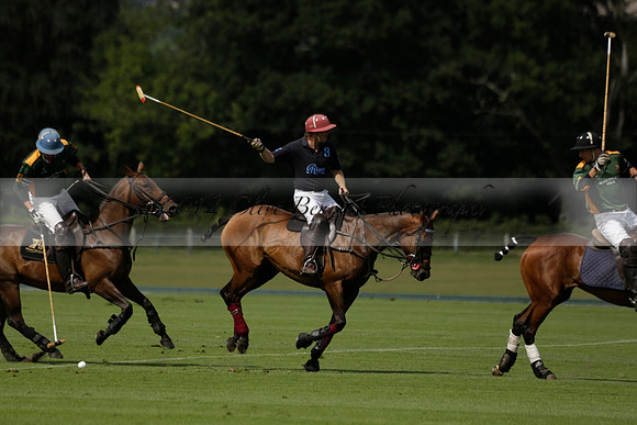 Maiz Dulce (green) v River (blue) in a Uber Polo Midsummer 12 goal polo match on Wednesday 21 August 2013 at Cowdray park Polo Club on Ambersham 2.  www.polopictures.co.uk