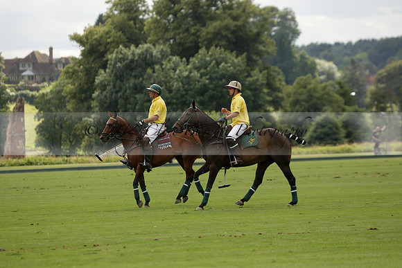 La Tremenda (lilac) v Maiz Dulce (yellow) in a Brecknock Cup polo match played on Lawns 1 at the Cowdray Park Polo Club on Tuesday 13 August 2013