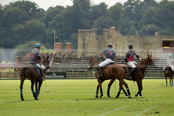 La Tremenda (lilac) v Maiz Dulce (yellow) in a Brecknock Cup polo match played on Lawns 1 at the Cowdray Park Polo Club on Tuesday 13 August 2013