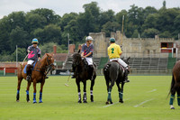 La Tremenda (lilac) v Maiz Dulce (yellow) in a Brecknock Cup polo match played on Lawns 1 at the Cowdray Park Polo Club on Tuesday 13 August 2013