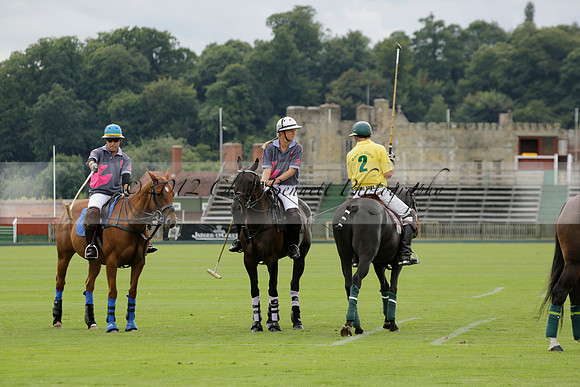 La Tremenda (lilac) v Maiz Dulce (yellow) in a Brecknock Cup polo match played on Lawns 1 at the Cowdray Park Polo Club on Tuesday 13 August 2013