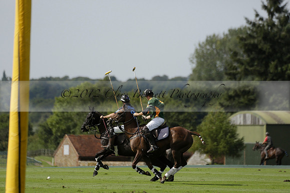 Maiz Dulce (green) v River (blue) in a Uber Polo Midsummer 12 goal polo match on Wednesday 21 August 2013 at Cowdray park Polo Club on Ambersham 2.  www.polopictures.co.uk