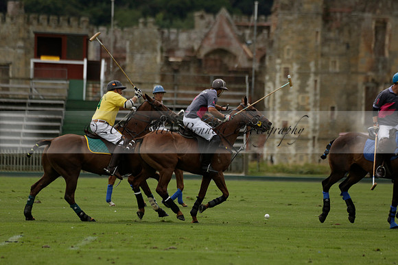 La Tremenda (lilac) v Maiz Dulce (yellow) in a Brecknock Cup polo match played on Lawns 1 at the Cowdray Park Polo Club on Tuesday 13 August 2013