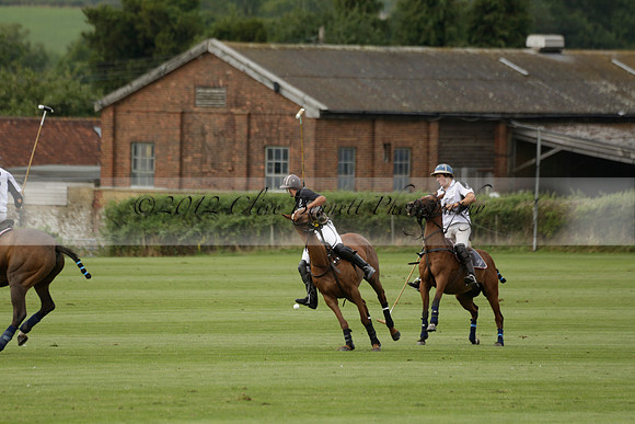 Beau Design v Boscom in an August Rother Cup 4 goal polo match at Cowdray Park Polo Club on Wednesday 07 August 2013