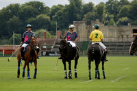 La Tremenda (lilac) v Maiz Dulce (yellow) in a Brecknock Cup polo match played on Lawns 1 at the Cowdray Park Polo Club on Tuesday 13 August 2013