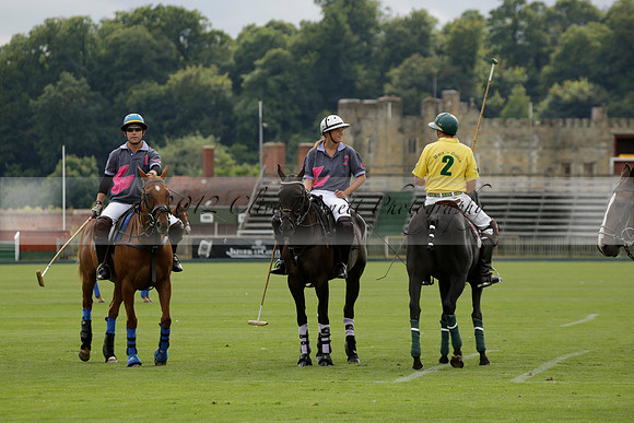 La Tremenda (lilac) v Maiz Dulce (yellow) in a Brecknock Cup polo match played on Lawns 1 at the Cowdray Park Polo Club on Tuesday 13 August 2013
