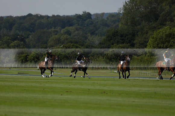 Maiz Dulce (green) v River (blue) in a Uber Polo Midsummer 12 goal polo match on Wednesday 21 August 2013 at Cowdray park Polo Club on Ambersham 2.  www.polopictures.co.uk