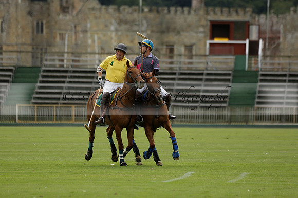 La Tremenda (lilac) v Maiz Dulce (yellow) in a Brecknock Cup polo match played on Lawns 1 at the Cowdray Park Polo Club on Tuesday 13 August 2013