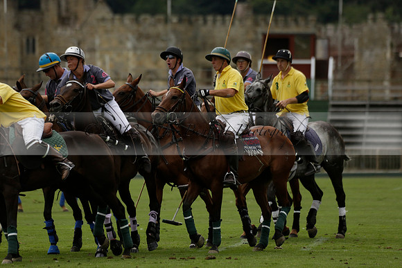 La Tremenda (lilac) v Maiz Dulce (yellow) in a Brecknock Cup polo match played on Lawns 1 at the Cowdray Park Polo Club on Tuesday 13 August 2013