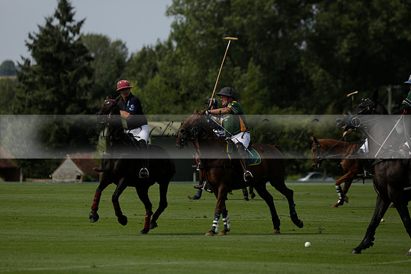 Maiz Dulce (green) v River (blue) in a Uber Polo Midsummer 12 goal polo match on Wednesday 21 August 2013 at Cowdray park Polo Club on Ambersham 2.  www.polopictures.co.uk