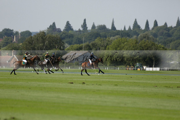 Maiz Dulce (green) v River (blue) in a Uber Polo Midsummer 12 goal polo match on Wednesday 21 August 2013 at Cowdray park Polo Club on Ambersham 2.  www.polopictures.co.uk