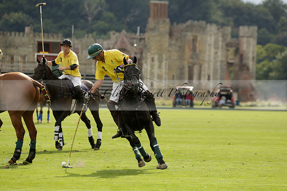 La Tremenda (lilac) v Maiz Dulce (yellow) in a Brecknock Cup polo match played on Lawns 1 at the Cowdray Park Polo Club on Tuesday 13 August 2013