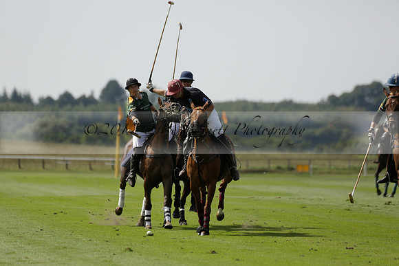 Maiz Dulce (green) v River (blue) in a Uber Polo Midsummer 12 goal polo match on Wednesday 21 August 2013 at Cowdray park Polo Club on Ambersham 2.  www.polopictures.co.uk