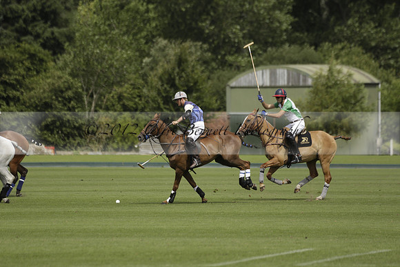 Burningfold (blue) v Wairakei Pastoral (green) in the Ruins Cup Final on Sunday 04 August 2013.
