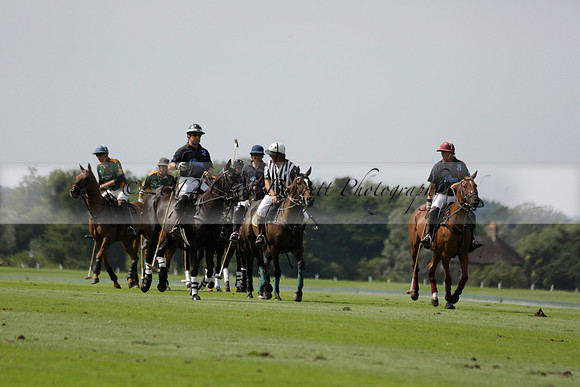 Maiz Dulce (green) v River (blue) in a Uber Polo Midsummer 12 goal polo match on Wednesday 21 August 2013 at Cowdray park Polo Club on Ambersham 2.  www.polopictures.co.uk