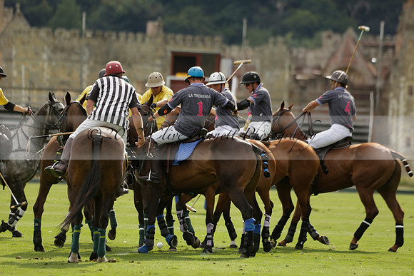 La Tremenda (lilac) v Maiz Dulce (yellow) in a Brecknock Cup polo match played on Lawns 1 at the Cowdray Park Polo Club on Tuesday 13 August 2013
