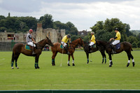 La Tremenda (lilac) v Maiz Dulce (yellow) in a Brecknock Cup polo match played on Lawns 1 at the Cowdray Park Polo Club on Tuesday 13 August 2013