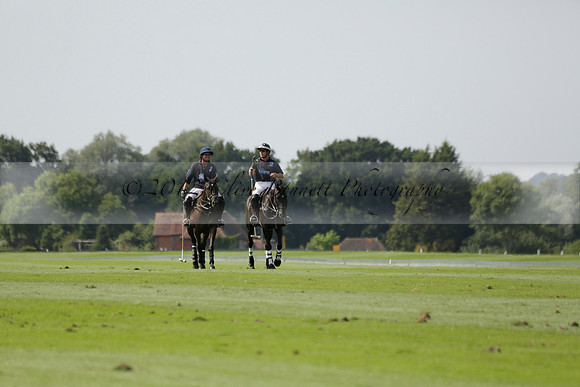 Maiz Dulce (green) v River (blue) in a Uber Polo Midsummer 12 goal polo match on Wednesday 21 August 2013 at Cowdray park Polo Club on Ambersham 2.  www.polopictures.co.uk