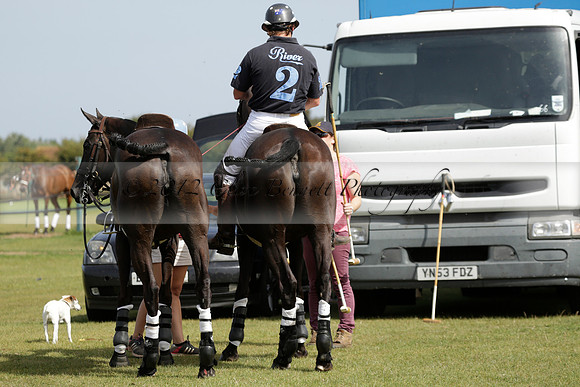 Maiz Dulce (green) v River (blue) in a Uber Polo Midsummer 12 goal polo match on Wednesday 21 August 2013 at Cowdray park Polo Club on Ambersham 2.  www.polopictures.co.uk