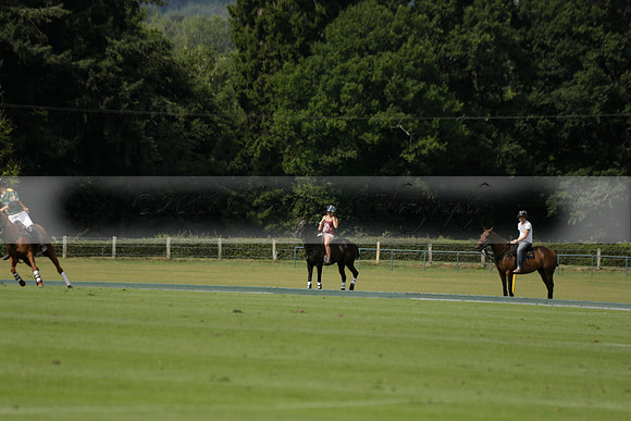 Maiz Dulce (green) v River (blue) in a Uber Polo Midsummer 12 goal polo match on Wednesday 21 August 2013 at Cowdray park Polo Club on Ambersham 2.  www.polopictures.co.uk