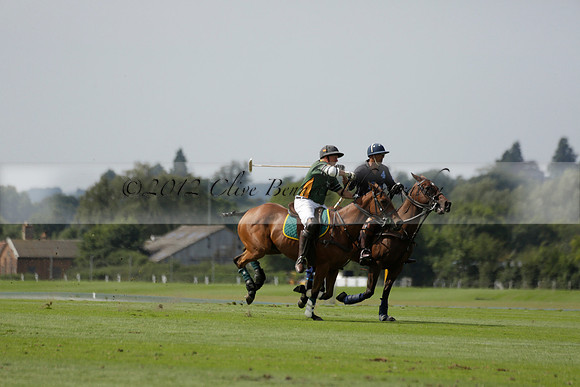 Maiz Dulce (green) v River (blue) in a Uber Polo Midsummer 12 goal polo match on Wednesday 21 August 2013 at Cowdray park Polo Club on Ambersham 2.  www.polopictures.co.uk