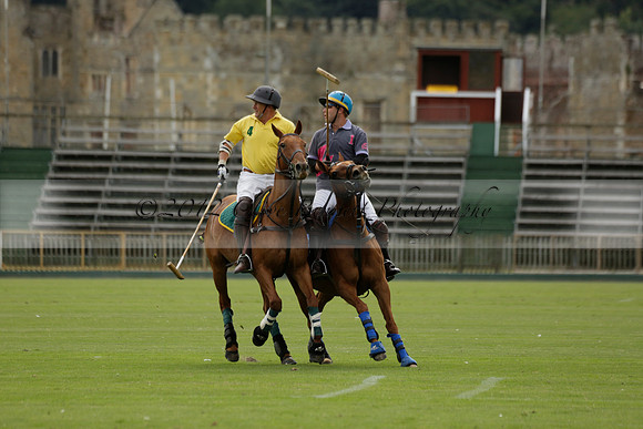 La Tremenda (lilac) v Maiz Dulce (yellow) in a Brecknock Cup polo match played on Lawns 1 at the Cowdray Park Polo Club on Tuesday 13 August 2013