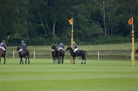 La Tremenda (mauve) v Maiz Dulce (green) in the Brecknock Cup  final polo match. Played at Cowdray Park Polo Club on Sunday 25 August 2013 on Ambersham 1. www.polopictures.co.uk
