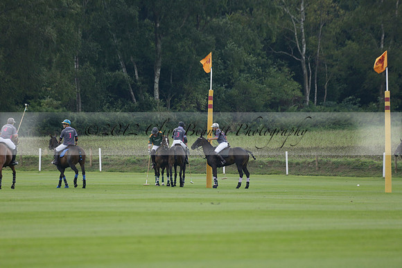 La Tremenda (mauve) v Maiz Dulce (green) in the Brecknock Cup  final polo match. Played at Cowdray Park Polo Club on Sunday 25 August 2013 on Ambersham 1. www.polopictures.co.uk