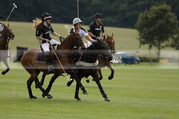 Beau Design v Boscom in an August Rother Cup 4 goal polo match at Cowdray Park Polo Club on Wednesday 07 August 2013