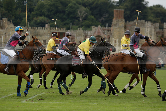 La Tremenda (lilac) v Maiz Dulce (yellow) in a Brecknock Cup polo match played on Lawns 1 at the Cowdray Park Polo Club on Tuesday 13 August 2013