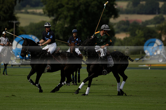 Maiz Dulce (green) v River (blue) in a Uber Polo Midsummer 12 goal polo match on Wednesday 21 August 2013 at Cowdray park Polo Club on Ambersham 2.  www.polopictures.co.uk