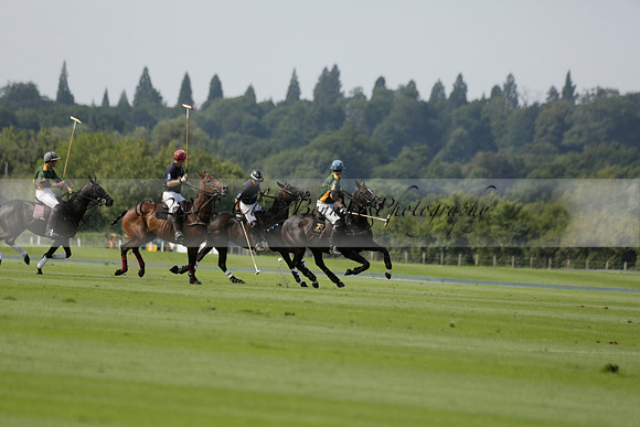 Maiz Dulce (green) v River (blue) in a Uber Polo Midsummer 12 goal polo match on Wednesday 21 August 2013 at Cowdray park Polo Club on Ambersham 2.  www.polopictures.co.uk
