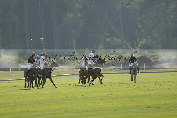 Pluma Negra (white) v Shoreline (black) in the Brecknock Cup Subsidiary final polo match played on Sunday 25 August 2013 at Cowdray Park Polo Club on Ambersham 1. 2013.10.12 www.polopictures.co.uk