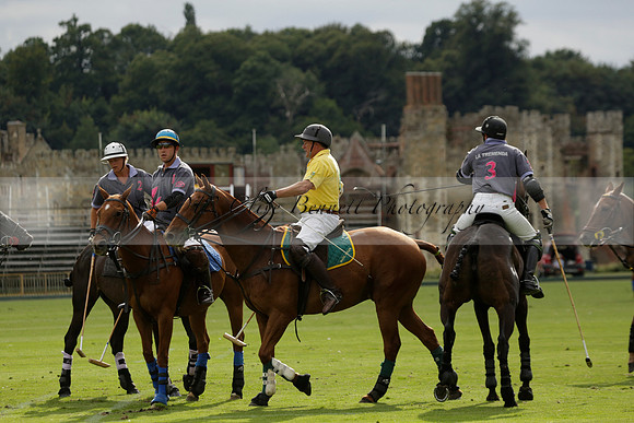 La Tremenda (lilac) v Maiz Dulce (yellow) in a Brecknock Cup polo match played on Lawns 1 at the Cowdray Park Polo Club on Tuesday 13 August 2013