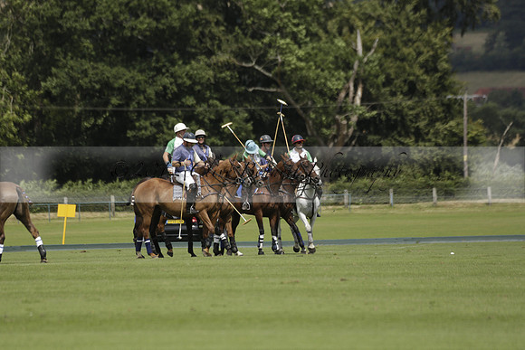 Burningfold (blue) v Wairakei Pastoral (green) in the Ruins Cup Final on Sunday 04 August 2013.