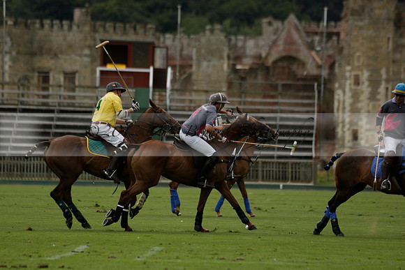 La Tremenda (lilac) v Maiz Dulce (yellow) in a Brecknock Cup polo match played on Lawns 1 at the Cowdray Park Polo Club on Tuesday 13 August 2013