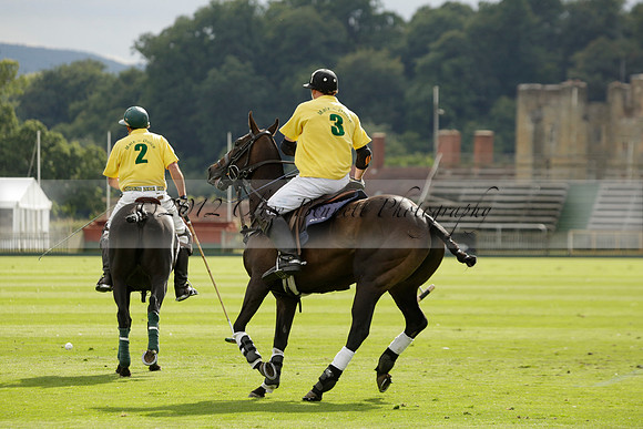 La Tremenda (lilac) v Maiz Dulce (yellow) in a Brecknock Cup polo match played on Lawns 1 at the Cowdray Park Polo Club on Tuesday 13 August 2013