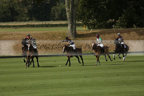 Jaeger Le Coultre (black)  v Wairakei Pastoral (white) in a Jaeger Le Coultre Holden White Cup polo match played on 29 July 2013 at Cowdray Park Polo Club on Brooksfieldwww.polopictures.co.uk