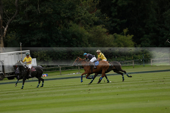 La Tremenda (lilac) v Maiz Dulce (yellow) in a Brecknock Cup polo match played on Lawns 1 at the Cowdray Park Polo Club on Tuesday 13 August 2013