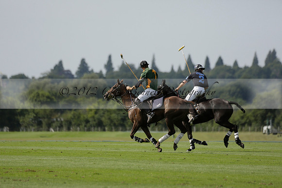 Maiz Dulce (green) v River (blue) in a Uber Polo Midsummer 12 goal polo match on Wednesday 21 August 2013 at Cowdray park Polo Club on Ambersham 2.  www.polopictures.co.uk
