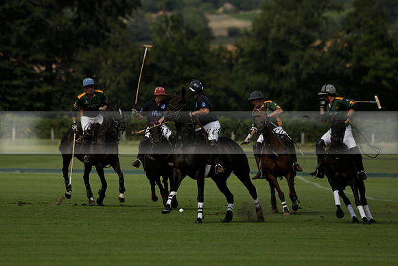 Maiz Dulce (green) v River (blue) in a Uber Polo Midsummer 12 goal polo match on Wednesday 21 August 2013 at Cowdray park Polo Club on Ambersham 2.  www.polopictures.co.uk