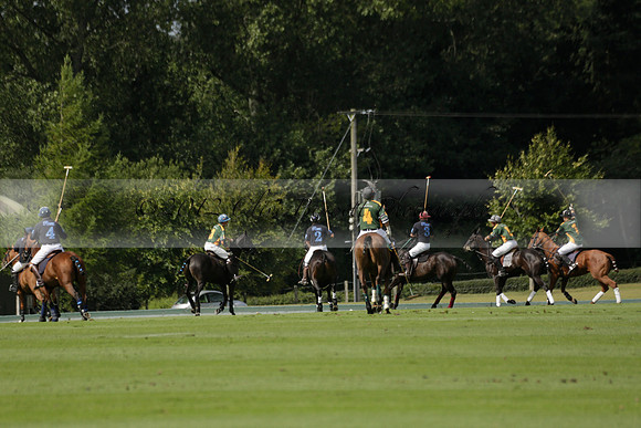Maiz Dulce (green) v River (blue) in a Uber Polo Midsummer 12 goal polo match on Wednesday 21 August 2013 at Cowdray park Polo Club on Ambersham 2.  www.polopictures.co.uk