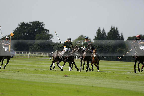 Maiz Dulce (green) v River (blue) in a Uber Polo Midsummer 12 goal polo match on Wednesday 21 August 2013 at Cowdray park Polo Club on Ambersham 2.  www.polopictures.co.uk