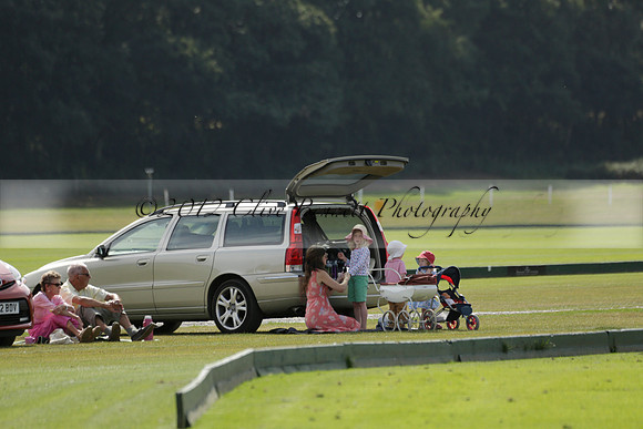 Maiz Dulce (green) v River (blue) in a Uber Polo Midsummer 12 goal polo match on Wednesday 21 August 2013 at Cowdray park Polo Club on Ambersham 2.  www.polopictures.co.uk